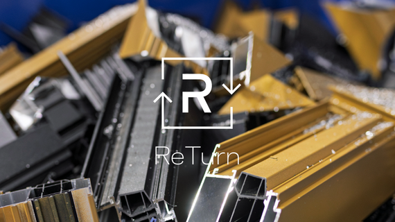 ReTurn logo in front of pile of aluminium scrap in blue bin.